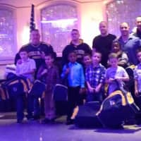 <p>Saddle Brook kids and coaches celebrate at the year-end football dinner.</p>