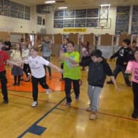 <p>Elmwood Park students at St. Leo&#x27;s dance in the dance-a-thon for Catholic Schools Week.</p>