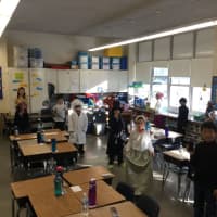 <p>Eastchester elementary school students acting out their roles as part of the &quot;living wax museum.&quot;</p>