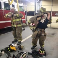 <p>Allendale firefighters practice putting on their equipment quickly.</p>