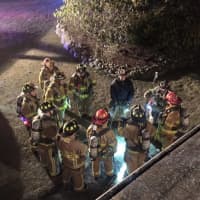 <p>Allendale firefighters get ready for practice drills at a borough house acquired for training purposes.</p>