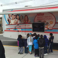 <p>Today, Doyle School had a visit from the Colgate Bright Smiles Van as part of the Terracycle Playground Contest, for which the school won second place. Doyle had about 200 students receive screenings.</p>