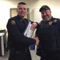 <p>Capt. Timothy Berry and Officer Jeff Loock</p>