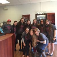 <p>Frisch School students donate hair to be used for wigs for women and children with cancer.</p>