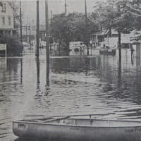 <p>Flood waters at Wagaraw Road and Lincoln Ave. in Hawthorne in 1968.</p>