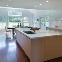 <p>The kitchen of 6 South Sterling features new granite countertops and a window overlooking the three acres of land.</p>