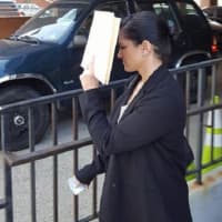<p>Jennifer Caruso (Cook) leaving Central Municipal Court in Hackensack after her plea bargain.</p>