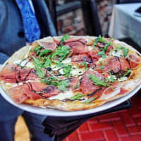 <p>A Fig and Prosciutto Pizza straight from Arezzo&#x27;s brick oven.</p>