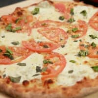 <p>Fire Engine Pizza Co.is known for its specialty pies.</p>