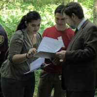 <p>New Rochelle Schools Superintendent Brian Osborne got in on the action with some students from the forensics class.</p>