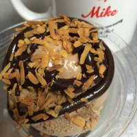 <p>Valrhona chocolate ice cream, Valrhona cold hot fudge and toasted coconut at Ice Cream by Mike in Hackensack.</p>