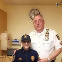 <p>Fort Lee Chief Keith M. Bendul with &quot;Chief For a Day&quot; Briana Lopez.</p>