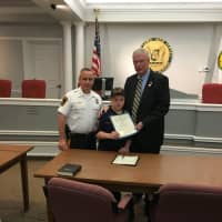 <p>Fair Lawn Mayor John Cosgrove swears in David Hickey as Police Chief For a Day.</p>