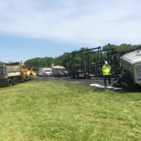 <p>The car carrier that struck the DOT dump truck also nearly struck two workers.</p>
