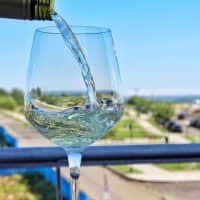 <p>A glass of wine and a view at Sign of the Whale in Stamford.</p>