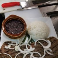 <p>Steak and onions with rice and beans at North Arlington&#x27;s Antiguo.</p>