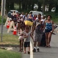 <p>Beachgoers are allowed to walk in to Squantz Pond State Park in New Fairfield even after the parking lot is filled, as was the case on Sunday.</p>