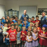 <p>A group of Westwood children brought homemade goodies and &quot;thank you&quot; cards to the Westwood Police Department.</p>