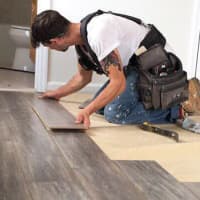 <p>Real Renovations lays the floorboards.</p>