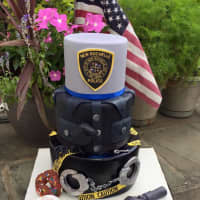 <p>Cake D&#x27;Out Creations celebrated the occasion with a personalized New Rochelle Police Department cake.</p>