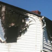 <p>Firefighters contained the blaze to the second floor and attic of the Stratford duplex.</p>