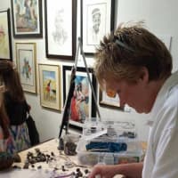 <p>Darlene Garrison creates jewelry while at Workspace Collective on Main Street in Danbury.</p>