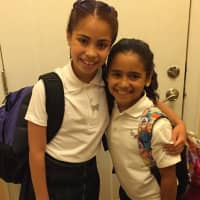 <p>Wayne&#x27;s Immaculate Heart of Mary 6th grader Isabella Galan, left, and sister Victoria Galan, 3rd grade, are ready for day 1.</p>
