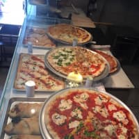 <p>Carmel Brick Oven Pizza &amp; Cafe offers many gourmet pizzas.</p>