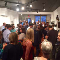 <p>Dozens showed up at harry A Rothmans in Bronxville for its grand opening this week.</p>