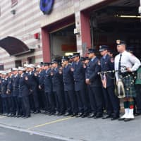 <p>Firefighters who served with Battalion Chief Michael Fahy, who was killed on Tuesday, gather to honor him on Wednesday.</p>