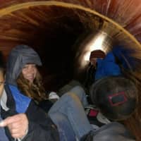 <p>Four protesters Monday climbed inside one of the pipes being used to construct the Algonquin Pipeline.</p>