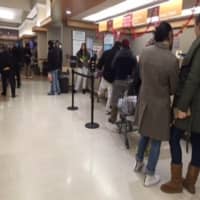 <p>People wait in line to buy lottery tickets at the Stop and Shop in Port Chester.</p>