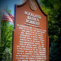 <p>A plaque marks the spot were two Nyack police officers were killed during by a group of gunmen who had robbed a Brinks truck.</p>