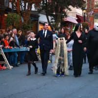 <p>The Addams Family, winner for Best Group Costume, at the Tarrytown Halloween Parade.</p>