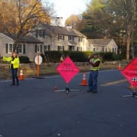 <p>Wilton CERT is helping with traffic control at the scene of a water main break on Westport Road in Wilton on Tuesday.</p>
