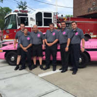 <p>John LaFalce, third from left, and Pink Heals Bergen County officials at Engine Co. 3 in Ridgefield.</p>