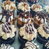 <p>Some of the decadent choices at Whipped Cupcakes.</p>
