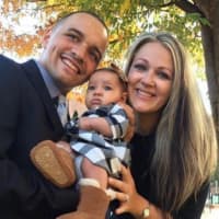 <p>Steph Arcell and Mike Miesch of East Rutherford with their baby girl.</p>