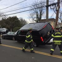 <p>The driver of this car had no explanation of how he ended up on top of a parked vehicle on Elm Street in Greenwich on Thursday.</p>