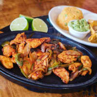 <p>Fajitas come out sizzling at Zapata Mexican Restaurant SONO newly opened in South Norwalk.</p>