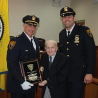 <p>Dr. John F. Salimbene is shown with Tuckahoe police Chief John Costanzo, left, and Lt. Andrew Zirolnik after the Scarsdale doctor received a plaque declaring him &quot;Tuckahoe Police Surgeon Emeritus.”</p>