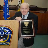 <p>Dr. John F. Salimbene, who served as the Tuckahoe Police Department’s surgeon for five decades, was killed in a house fire last weekend.  He is shown at an award ceremony in May where he was presented with a plaque.</p>
