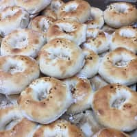 <p>Hot onion bialys at Bagel King of Fairfield.</p>