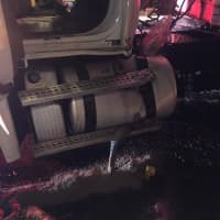 <p>Approximately 20 gallons of diesel fuel spilled onto Route 6 from the tractor trailer.</p>
