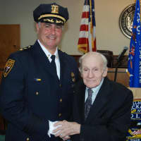 <p>Tuckahoe police Chief John Costanzo shakes hands with longtime staff surgeon Dr. John F. Salimbene in May. The beloved Scarsdale family physician was killed in a house fire Sunday.</p>