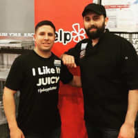 <p>Juicy Platters&#x27; outreach official and Fair Lawn police officer Louie Vazquez with Wahdat, who together have donated countless meals to Bergen County residents in need.</p>