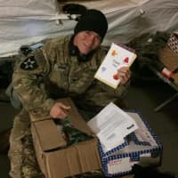 <p>Soldiers stationed overseas receiving their care packages from United For The Troops.</p>