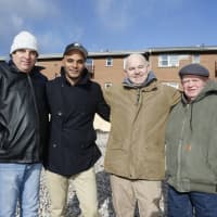 <p>Marcus Wallace, second from left, with Solomon Randelman, far left, Phillip Lavigne and Sheridan Ogden at the exact location in Teaneck where the trio saved him in 1985.</p>