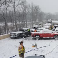 <p>A massive pileup of cars closed I-91 near Middletown on Saturday. The crash involved at least 20 cars and three tractor-trailers.</p>