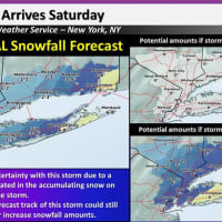 <p>Updated snowfall projections, including, at right, if the storm tracks east and if it tracks west, which would produce higher amounts.</p>